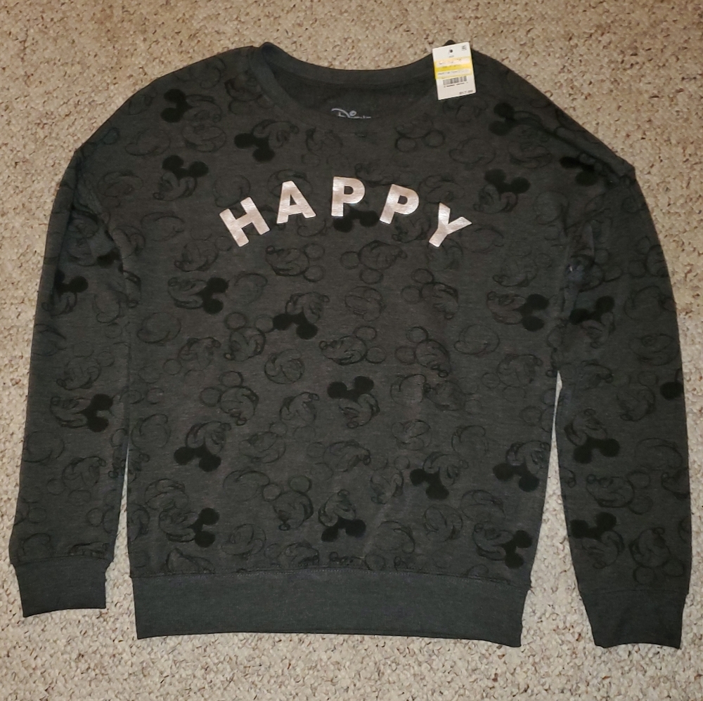 Disney sweatshirt has Mickey Mouse pattern…